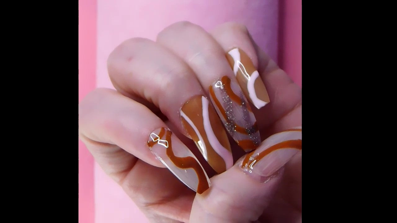 Load video: Nude and Brown Nail Swirls featuring Store Products!